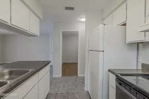 7813 N Lagoon Dr, Panama City Beach, FL 32408 - Photo 12