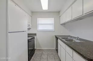 7813 N Lagoon Dr, Panama City Beach, FL 32408 - Photo 10