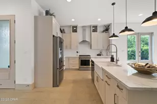 8597 N Lagoon Dr, Panama City Beach, FL 32408 - Photo 14