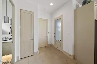 8597 N Lagoon Drive, Panama City, FL 32408 - Photo 32