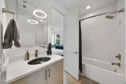 8597 N Lagoon Drive, Panama City, FL 32408 - Photo 54