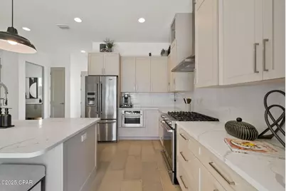 8597 N Lagoon Drive, Panama City, FL 32408 - Photo 18