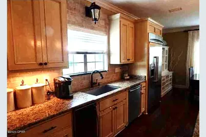 7009 N Lagoon Drive #116, Panama City, FL 32408 - Photo 10