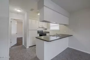 7813 N Lagoon Dr, Panama City Beach, FL 32408 - Photo 6