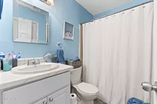 7813 N Lagoon Dr, Panama City, FL 32408 - Photo 18