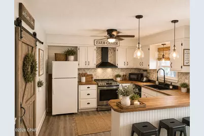 8908 N Lagoon Drive, Panama City, FL 32408 - Photo 14