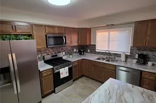 7114 Blue Spruce Dr, Northwoods, MO 63121 - Photo 6