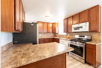 935 Kingsbrook Lane, Florissant, MO 63031 - Photo 12