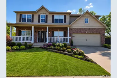 59 Charbonier Bluffs Drive, Florissant, MO 63031 - Photo 1