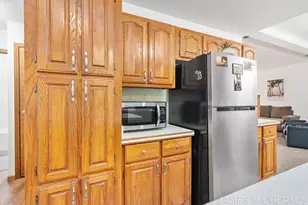 5621 Pine Island Dr NE, Comstock Park, MI 49321 - Photo 12