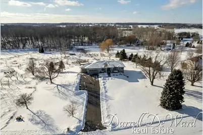 10701 Whispering Waters Lane SE, Caledonia, MI 49316 - Photo 32