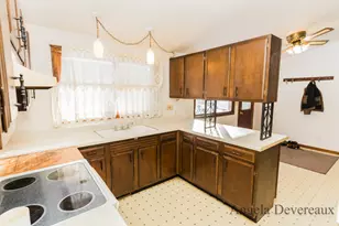 6040 N Hillman Rd, Six Lakes, MI 48886 - Photo 8