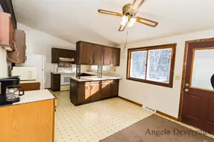 6040 N Hillman Rd, Six Lakes, MI 48886 - Photo 10