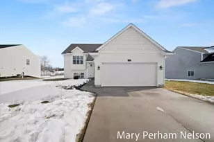 154 Sweet Meadow Dr NW, Kent City, MI 49330 - Photo 2