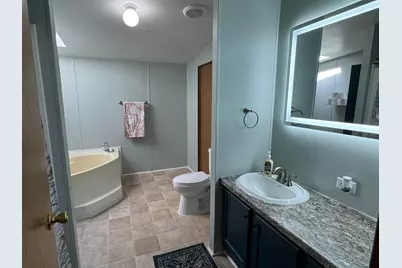 7204 E Grand River Ave #Lot 142, Portland, MI 48875 - Photo 24