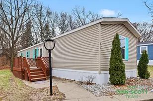 6913 Sandwood St NE, Rockford, MI 49341 - Photo 1