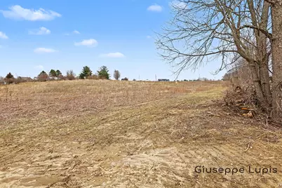 8707 Cannonsburg Road NE, Ada, MI 49301 - Photo 24