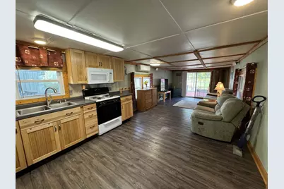 4499 Woodland Drive, Six Lakes, MI 48886 - Photo 4