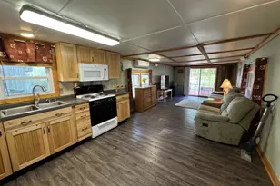 4499 Woodland Dr, Six Lakes, MI 48886 - Photo 4