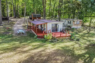 4499 Woodland Dr, Six Lakes, MI 48886 - Photo 1