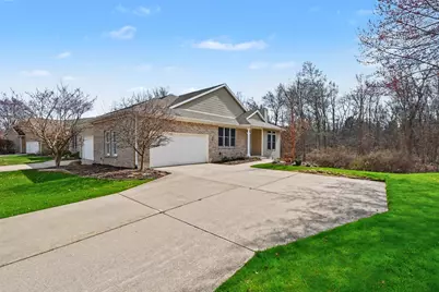 1127 Dogwood Meadows Drive SE, Ada, MI 49301 - Photo 2