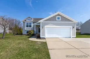 192 Sweet Meadow Dr, Kent City, MI 49330 - Photo 1