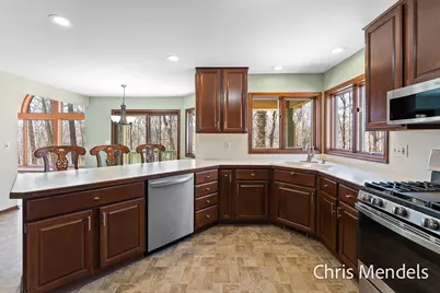 3140 Riverwoods Drive NE, Rockford, MI 49341 - Photo 20