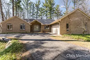 3140 Riverwoods Dr NE, Rockford, MI 49341 - Photo 1