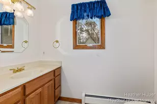 7706 Thornapple Bayou Dr SE, Grand Rapids, MI 49512 - Photo 24