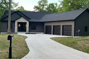 8670 N Island Dr, Canadian Lakes, MI 49346 - Photo 1