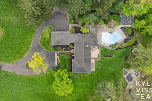 1585 River Oaks Dr SE, Ada, MI 49301 - Photo 2
