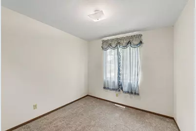 3880 Whispering Oaks Drive, Traverse City, MI 49696 - Photo 18