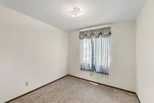 3880 Whispering Oaks Dr, Traverse City, MI 49696 - Photo 18