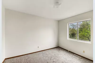 3880 Whispering Oaks Drive, Traverse City, MI 49696 - Photo 16