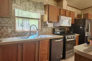 8033 Rolling Dr, Lake, MI 48632 - Photo 6