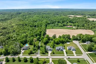 9579 Arrowcrest Dr NE, Rockford, MI 49341 - Photo 6