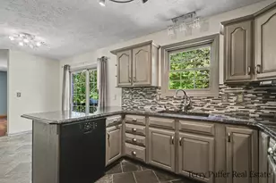 12080 Pine Cone Dr NE, Rockford, MI 49341 - Photo 6