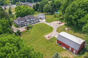 9111 Summit Ave NE, Rockford, MI 49341 - Photo 1