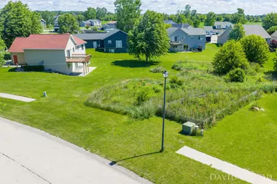 228 Chary Ridge Drive NW, Kent City, MI 49330 - Photo 4