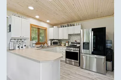 9551 Clubhouse Drive W, Canadian Lakes, MI 49346 - Photo 12