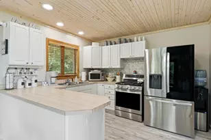 9551 Clubhouse Dr W, Canadian Lakes, MI 49346 - Photo 12