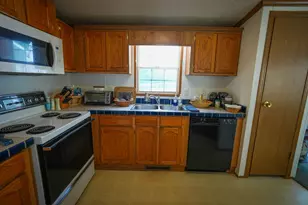 9339 Maple Hill Rd, Howard City, MI 49329 - Photo 12