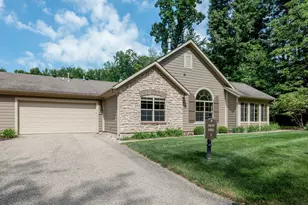 1055 Bridge Crest Dr SE, Ada, MI 49301 - Photo 2