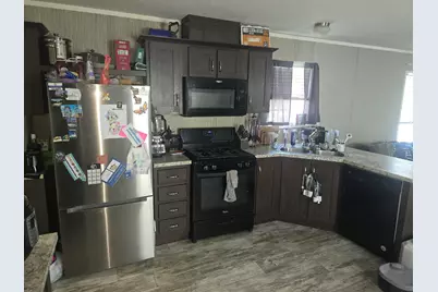 360 E Tuttle  Rd #55, Ionia, MI 48846 - Photo 8