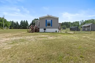 20089 W Lake Montcalm Rd, Howard City, MI 49329 - Photo 1