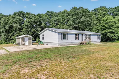 11703 Nichols Road, Holton, MI 49425 - Photo 1