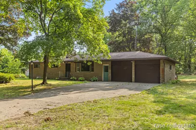 7676 Courtland Drive NE, Rockford, MI 49341 - Photo 2