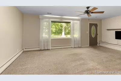 7676 Courtland Drive NE, Rockford, MI 49341 - Photo 4
