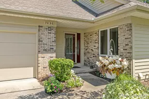 7036 Treetop Ln NE, Rockford, MI 49341 - Photo 2