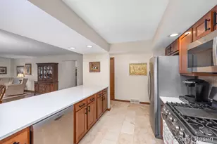 7036 Treetop Ln NE, Rockford, MI 49341 - Photo 6